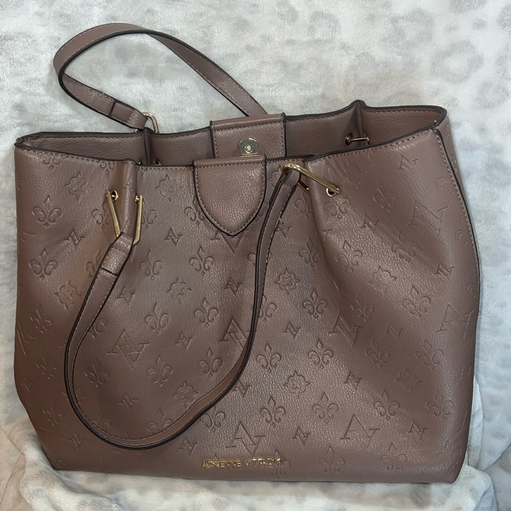 This beautiful Adrienne Vittadini bag never used brand new!